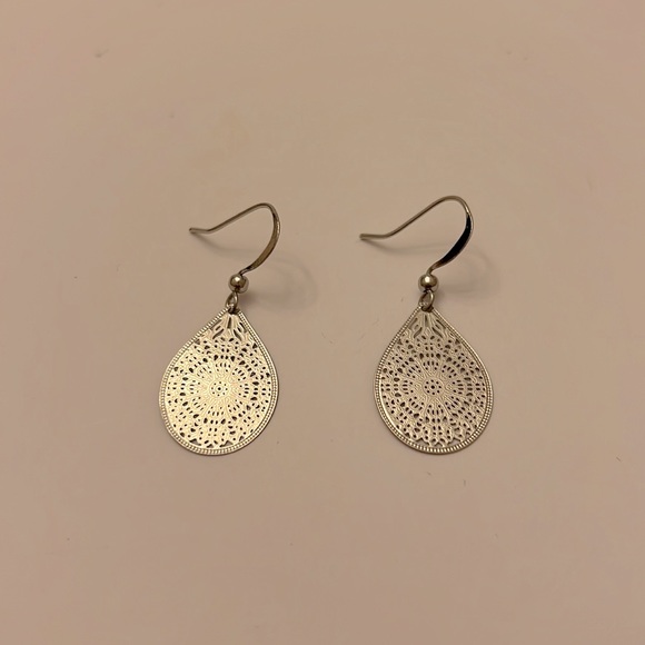 Jewelry - Dangle earrings in silver color.